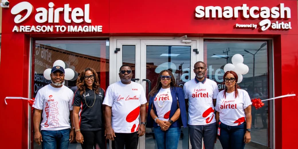 Airtel Nigeria team members outside a newly opened Airtel and Smartcash shop.