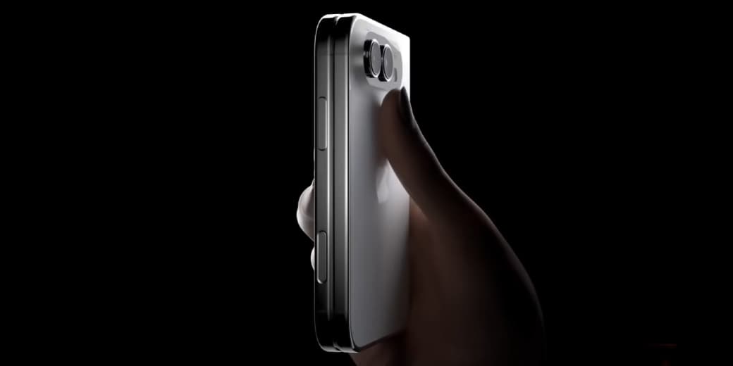 A foldable iPhone concept being held in low light. Credit: Geeky Gadgets.