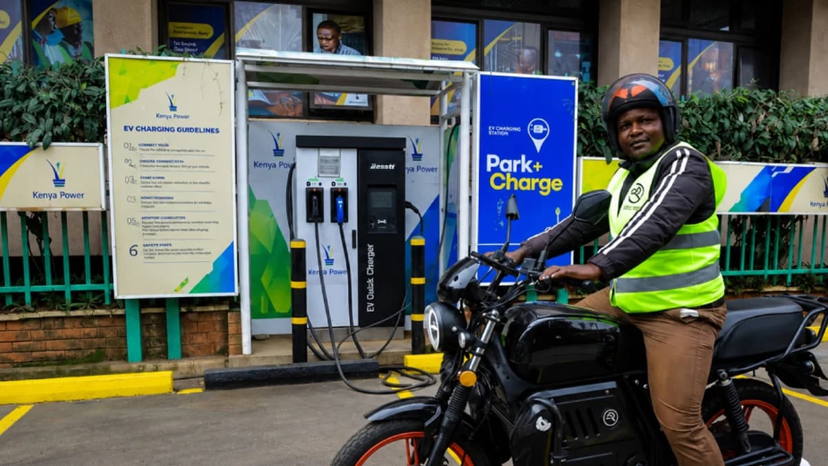 Electric motorcycles and commercial vehicles using charging and battery-swap points along an East African transport route.