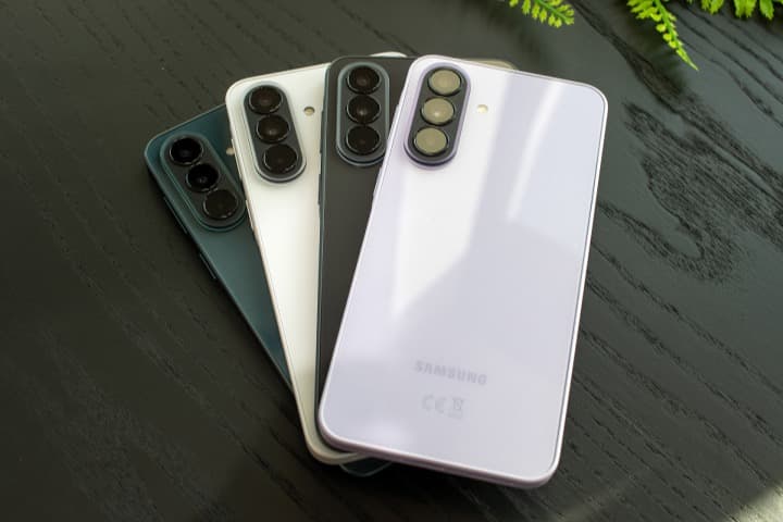 Samsung Galaxy A37 5G colour options laid out on a table. Credit: Daniel Schmidt.