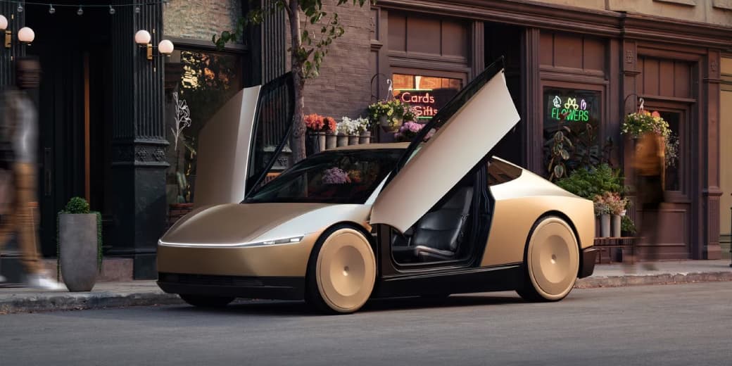 Tesla robotaxi with doors open on a city street. Credit: Tesla.